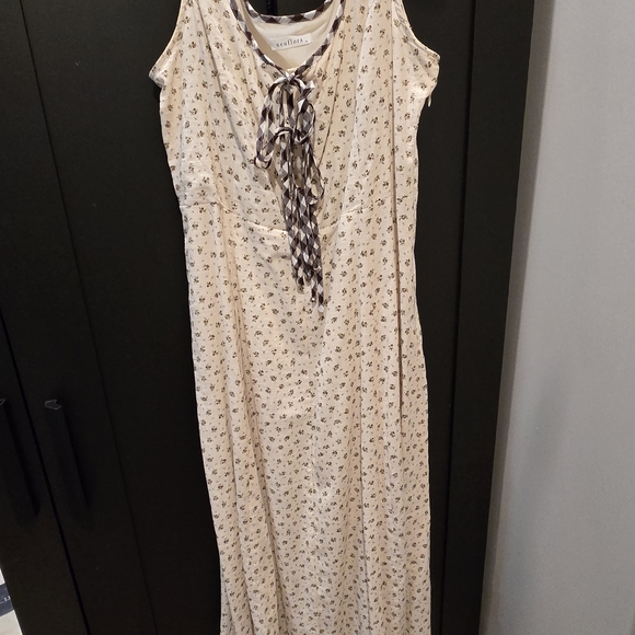 Neuflora Dresses & Skirts - Neuflora Sleeveless Cream Floral Midi Dress with Tie Neck Detail